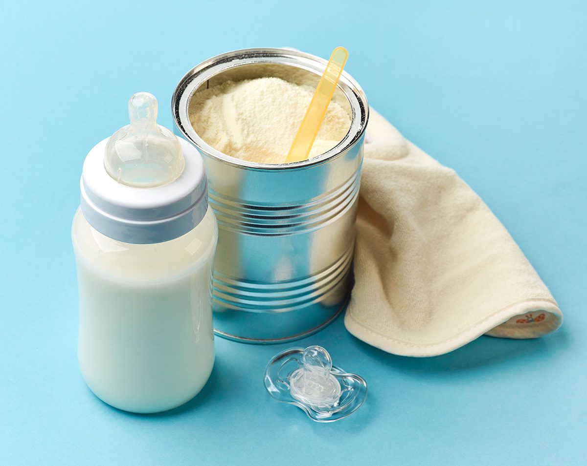 Baby Formula Savings Guide Baby formula bottle and measuring tools for Canadian parents seeking coupons and savings