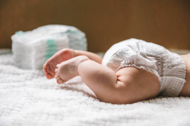 Finding diaper samples online in Canada Parent using smartphone to find free diaper samples through online communities and apps