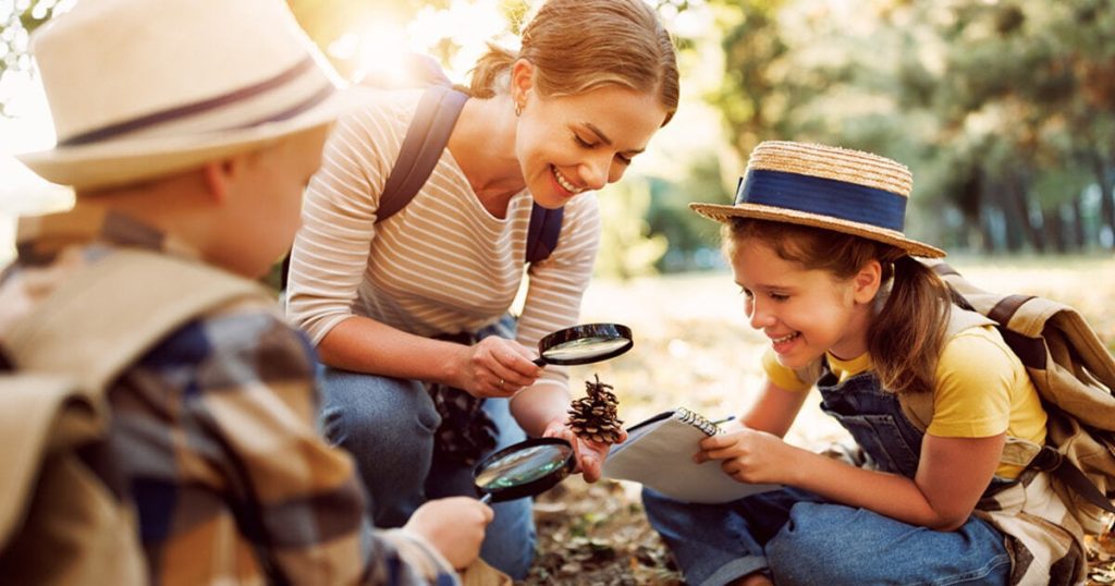 Summer Learning Resources for Canadian Families Canadian family engaged in summer learning activities with educational resources and nature exploration
