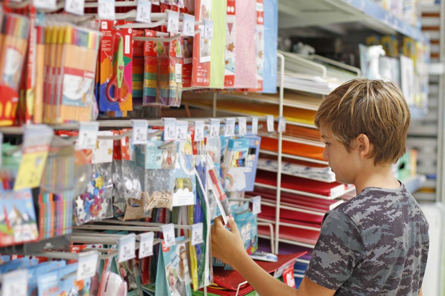 Family back to school shopping experience Parent and child shopping together for back to school supplies and clothing