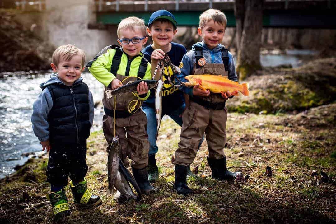 Fun fall outdoor activities for Canadian children and families Fall outdoor activities for kids in Canada showing children playing in autumn leaves
