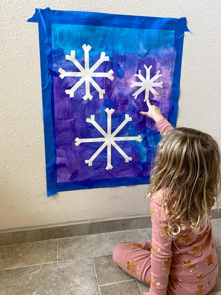 Kids creating holiday crafts together during Christmas