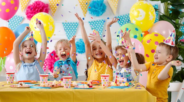Kids celebrating a birthday in Canada with free birthday freebies