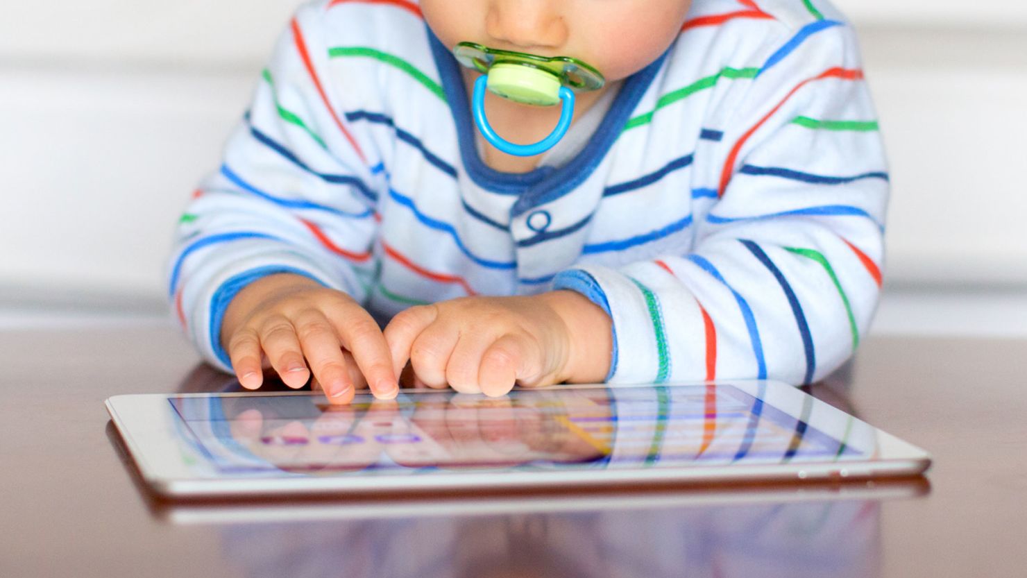 Baby watching tablet screen time